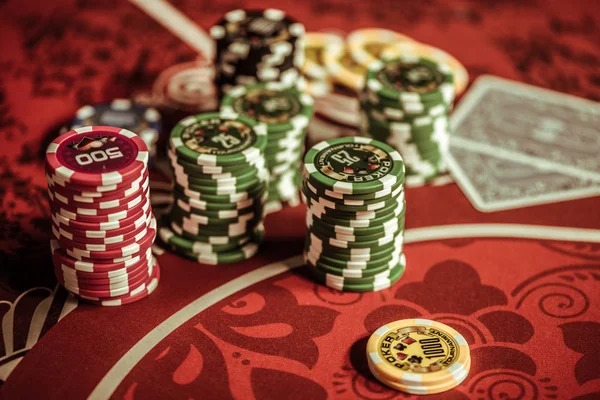 Mobile casino interface showing live dealer video feed and betting controls